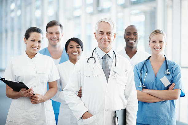 istock Senior doctor with successful medical team 143919905