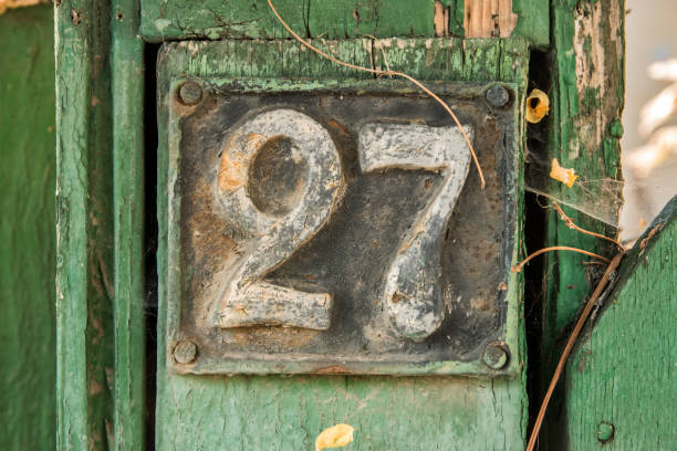 istock Old retro cast iron plate number 27 1439201382
