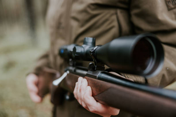 istock Close up of a hunting rifle with optics 1439201954