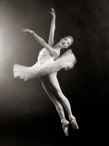istock Female ballet dancer jumping in air 143920461