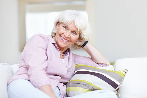 istock Smiling senior woman at home 143920504