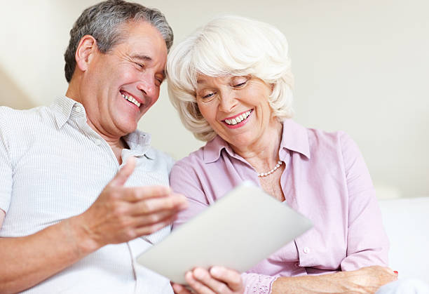 istock Senior couple with digital tablet 143920509