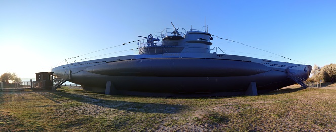 A US Navy submarine in port.