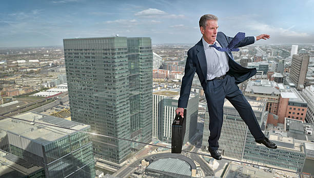 istock Business Man on Tightrope 143921023