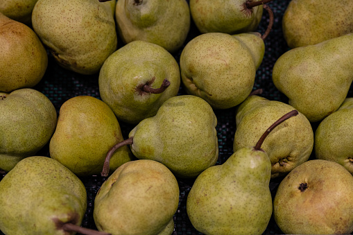 A variety of fresh fruits on the supermarket shelves