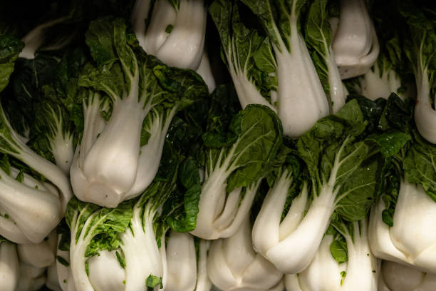 Close up of various vegetables on supermarket shelves