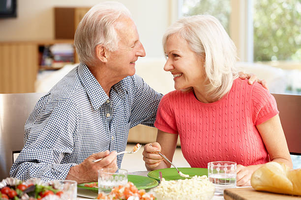 istock Senior couple sharing meal 143921282