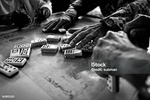 Hands Playing Dominos Stock Photo - Download Image Now - Domino, Miami, Cuban Culture