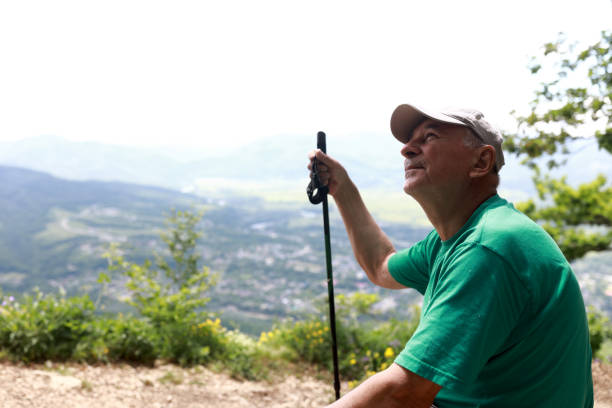 istock Senior man resting on Una-Koz ridge 1439214978