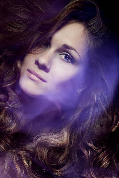 istock Young woman with curly hair 143921514