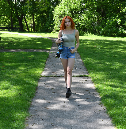 Beautiful young woman in a park