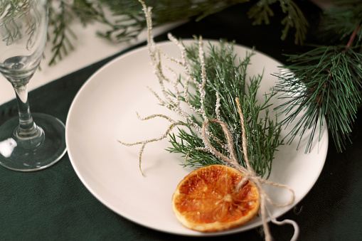 Festive Christmas table decoration.
Creative eco-friendly New Year and Christmas decor.Close up,selective focus.