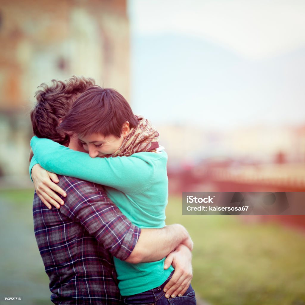 Romantic Young Couple Hugging Stock Photo - Download Image Now ...