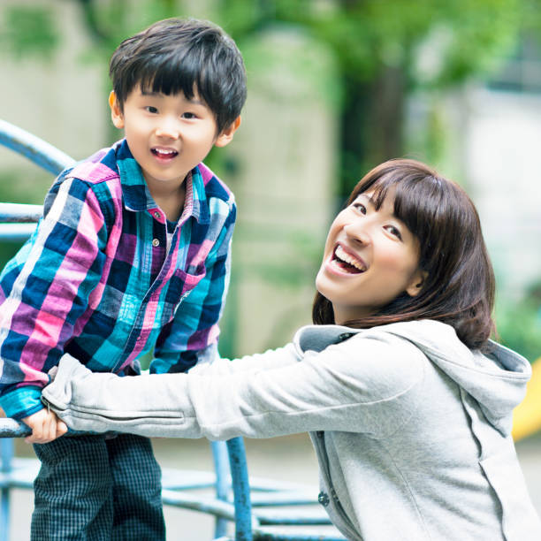 istock Happy mother and son in the park 143921738