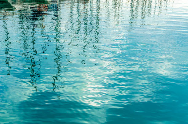 istock Reflection of boats in a port 1439219378