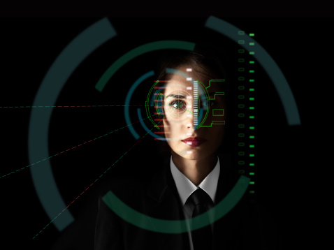 futuristic eye scanning interface on black background.