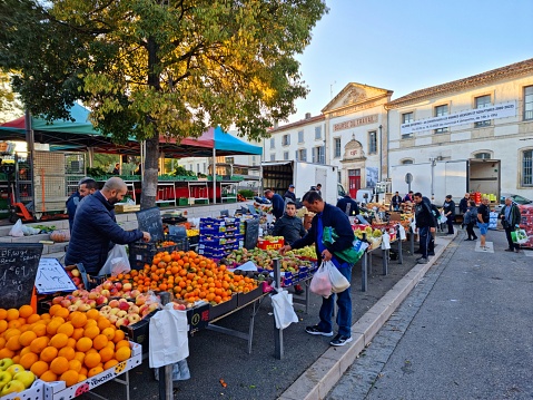 Arles located in the south of france has arround 52'800 inhabitants. The image shows the huge market of Arles captured during autumn season.