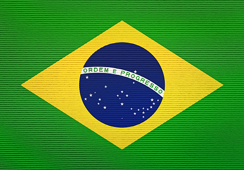 Brazilian national flag on corrugated paper, ready for your grunge effects to be applied.