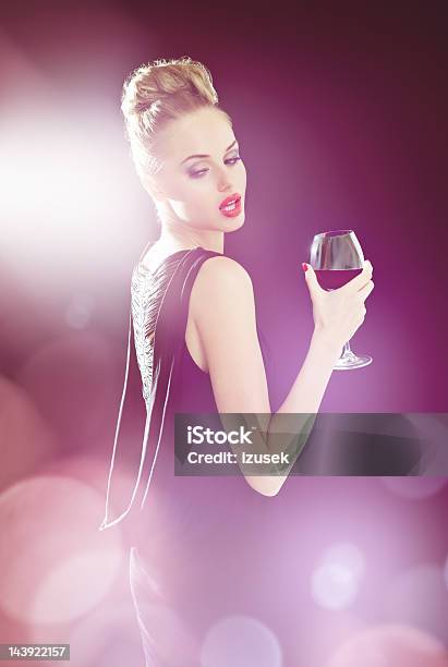 Beautiful Woman In Spotlights Stock Photo - Download Image Now - Spot Lit, Spotlight, One Woman Only