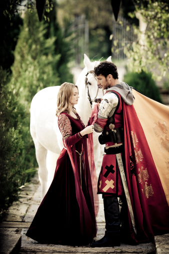 Farewell scene between medieval princess and knight for novel concepts,selective focus, creative dramatic color retouching to underline the ancient medieval time,vignetting and possible noise