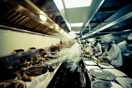 motion chefs  of a restaurant kitchen at china.