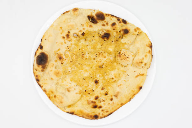istock Garlic Nan Bread on a White Plate 1439222294