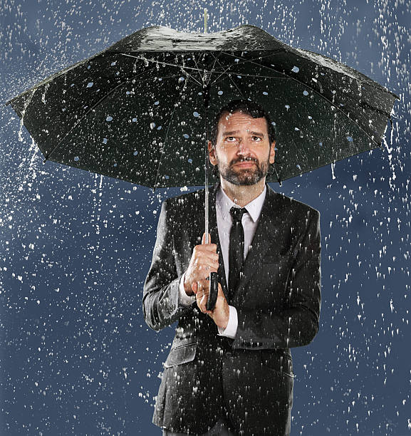 Umbrella Man - False Security stock photo