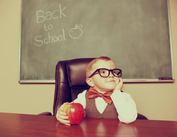 Happy Professor This little professor is ready to pass his smarts on. food elementary student healthy eating schoolboy stock pictures, royalty-free photos & images