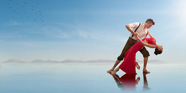 istock Romantic Couple Dancing on the Beach 143922480