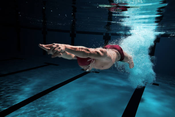 istock Swimmer under water after diving in 143922483