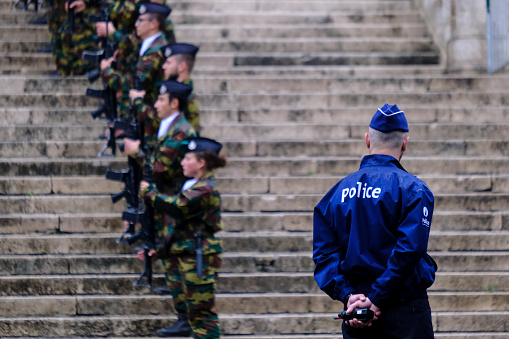 A policeman secures the area during a religious service at the cathedral on Belgian national day in Brussels, Belgium July 21, 2022.