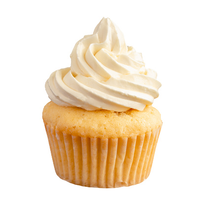 Side view of a vanilla cupcake with icing and a white paper wrapper