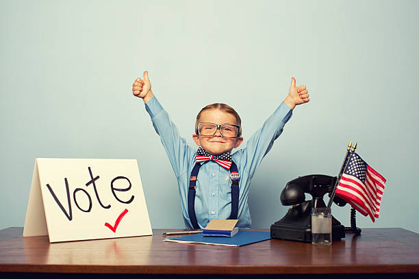 votar! - child flag patriotism thumbs up - fotografias e filmes do acervo