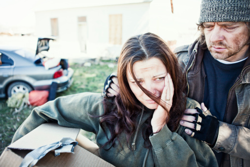 Homeless couple living out of their car.