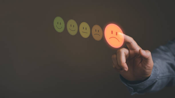 istock Person hand finger touching smile face for good online feedback service. 1439231367