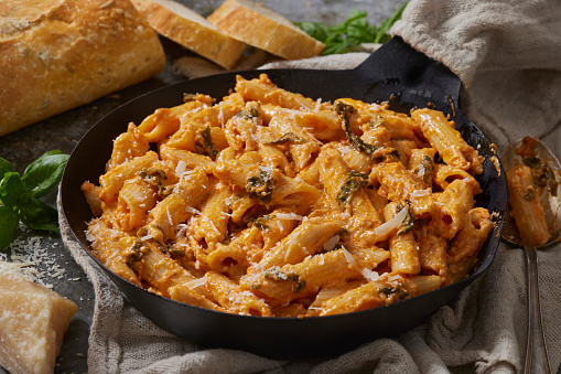 Creamy Tomato Penne with Fresh Basil, Parmesan Cheese and French Bread