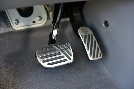 Brake pedal and the accelerator pedal in a car with automatic transmission