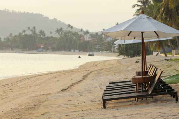 istock Empty beach chairs at a hotel in Thailand. 1439236710