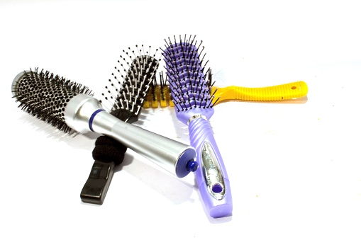 Many different hair combs isolated on the white background