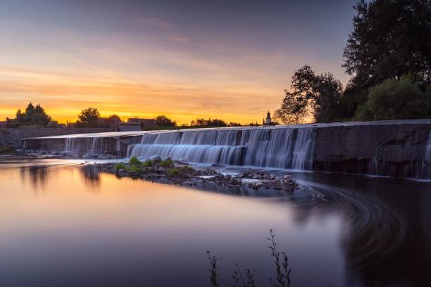istock Long exposure waterfall in a dam at sunset in Canada 1439237029
