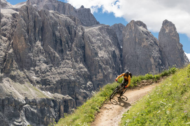 istock Male mountainbiker on scenic Dolomites trail, Italy. 1439237524