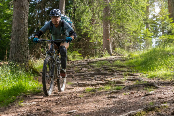 istock Mountainbiking over wooden carpet, Italy. 1439237770