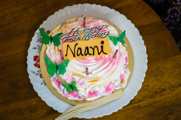 istock maternal grandmother birthday cake decorated with butterfly from different angle 1439241124