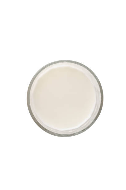 istock Glass of milk isolated on white background 1439246123
