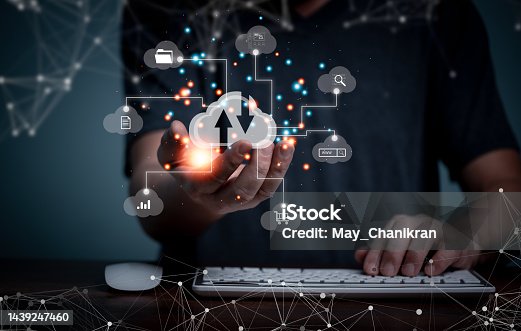 istock Cloud storage, Digital service data connection application network, transfers data to a server, hosting service. Web-based cloud concept. Business hands holding virtual Clouds services. 1439247460
