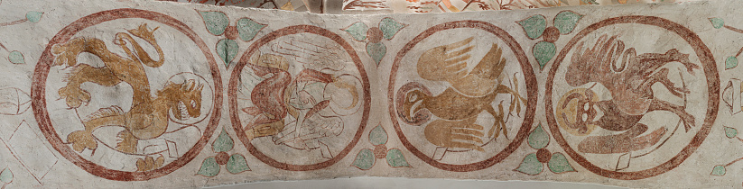 frescoes of symbol animals of the four evangelists in medallions in Fanefjord church, Denmark, October 10, 2022