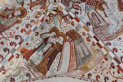 The visitation, an ancient fresco depicting Virgin Mary visiting Elisabeth, fresco in Fanefjord church, Denmark, October 10, 2022