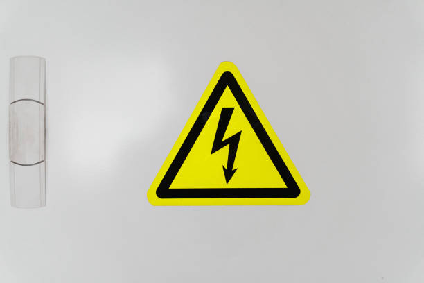 istock A shield with a yellow triangle and a lightning bolt signifies high voltage. 1439249560