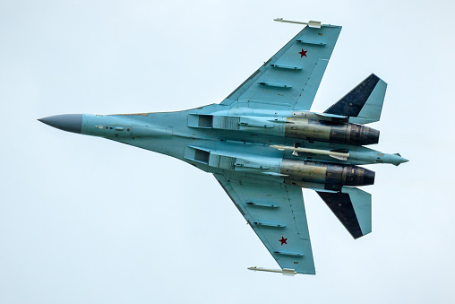 Russian Air Force plane Sukhoi Su-35 flies in sky, Russia