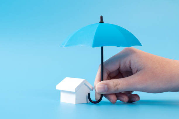 istock House model under blue color umbrella 1439250218